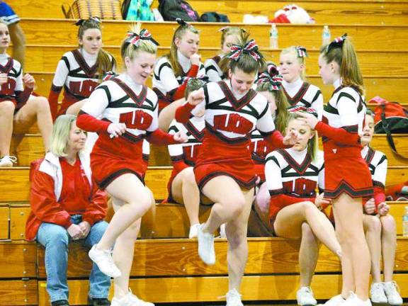 Sussex County teams garner awards at cheer compeition Photo by George LeRoy Hunter Members of the High Point Regional High School Wildcats cheer team practice steps.
