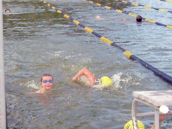 The Hurricanes practice their strokes (Photo by Janet Redyke)