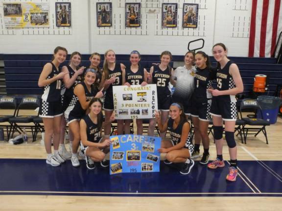 The team celebrates Jefferson senior Emily Poulas’s 195th three-pointer of her career.