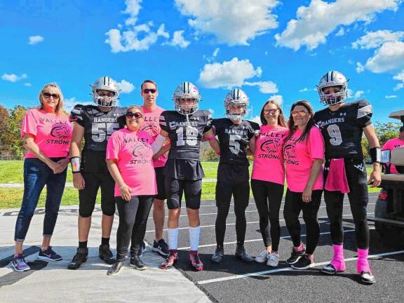 T-shirt sales benefit foundation Wallkill Valley Football Rangers pose with their mothers, all breast cancer survivors. (Photo provided)