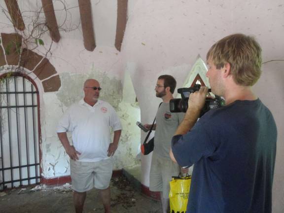 Documentary Filmmakers Erik Hummel and Brandon Stauffer interview Hamburg Councilman Dan Barr inside the Gingerbread Castle for an upcoming film.