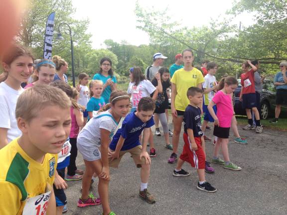 PHOTOS BY LAURIE GORDON Members of The Bears Youth Running Club line up for a local race.