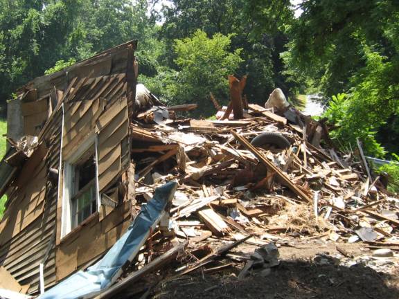 The rubble of a vacant house awaits removal from the property of the new Wawayanda Tree Farm on Barrett Road in Vernon.