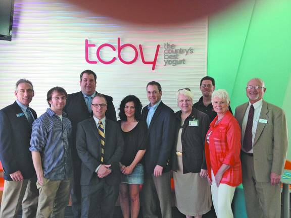 TCBY of Sussex Pictured from left: Doug Radford, Realty Executives Exceptional Realtors; Sean Highland, United Way of Northern New Jersey; Alex Aguado, State Farm Agency; Timothy Jackson, MetLife Home Loans, Cynthia Ann Rust, TCBY of Sussex; David Rust, TCBY of Sussex; Mary Ann Ryan, Hello Neighbor; Andy Ball, Think Newspaper; Pauline Richards, Club Z; and Jim Ryder, First Hope Bank.