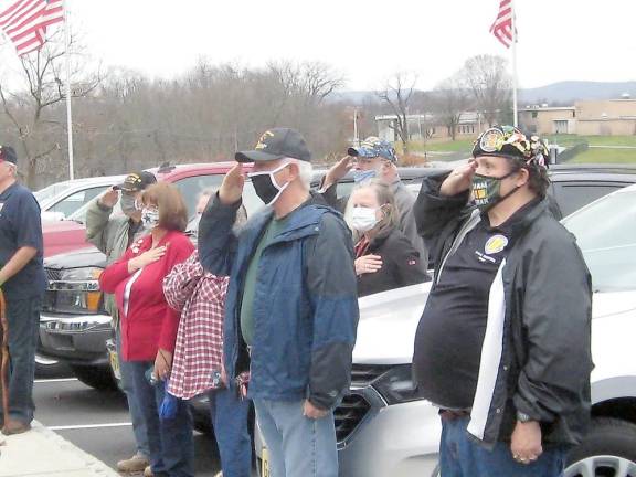 Participants recite the Pledge of Allegiance (Photo by Janet Redyke)