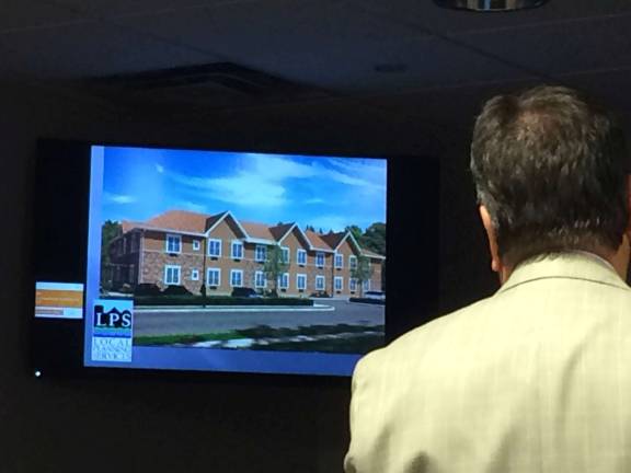 Planners show new vision for Main Street A representation of what the homes would look lilke is displayed.