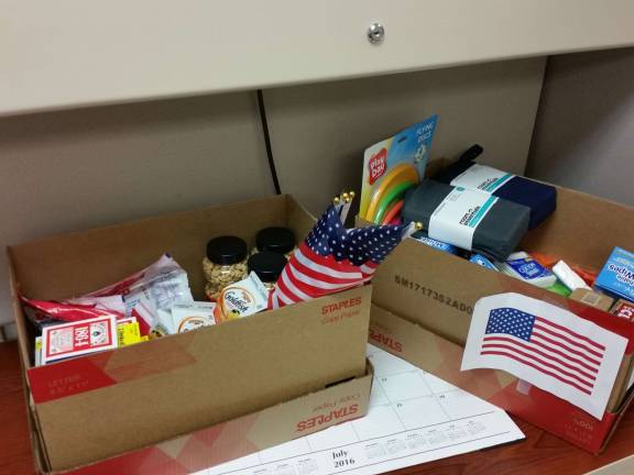 Law firm sends care package to troops