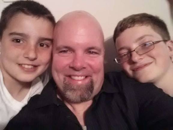 Sean O'Regan with his sons Connor and Tristan of Warwick, N.Y.