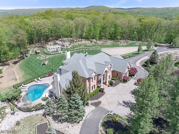 Home on five manicured acres has pool, movie theater Home on five manicured acres has pool, movie theater