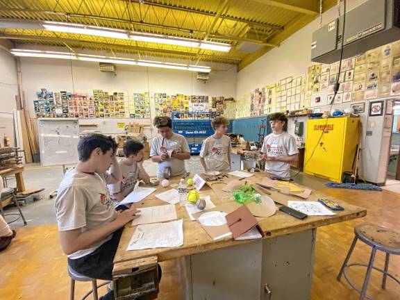 Students build water rockets ST2 Sussex County Charter School students, from left, Trevor Weinberg, Lar Gustafson, Jackson Tilley, Andrew Besthorne and Eric Ruiz design and build their rocket during the event at Wallkill Valley Regional High School.