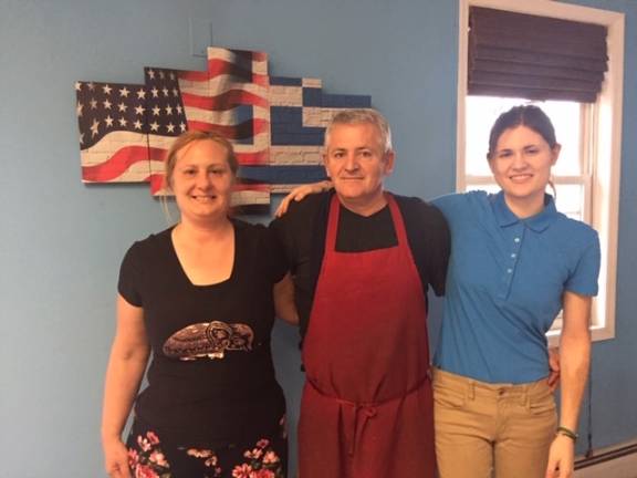 Yia Yia’s serves authentic Greek food with a cup of hospitality From left: Anastasia Zois, Yiorgos Hrissohoidis, and Eva Hrissohoidis (Photo by Marilyn Rosenthal)