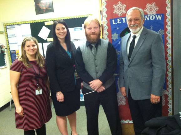 @PhotoCaption.SN:From left, Michelle Telischak, supervisor of instruction; Stephanie Bonaparte, assistant principal; Ray DeLear, chorus and band director; and Ernest Palestis, interim superintendent/principal of Ogdensburg Elementary School.