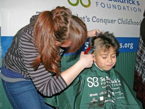 Irish Cottage Inn hosts St. Baldrick's fundraiser Adrian Guzman, 8, of Stanhope had five sponsors and raised $150 for St. BaldrickþÄôs Foundation. His haircutter is Maureen Pezzotta of Prohaircutters of Rockaway.