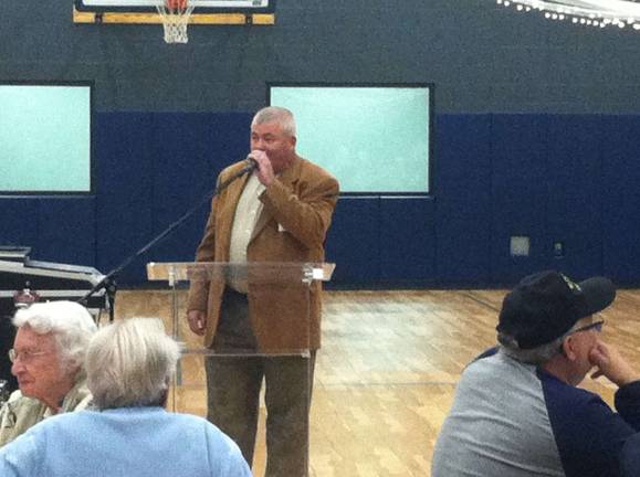 Photos by Laura J. Marchese The Rev. Bob Meeker speaks at the veterans dinner.