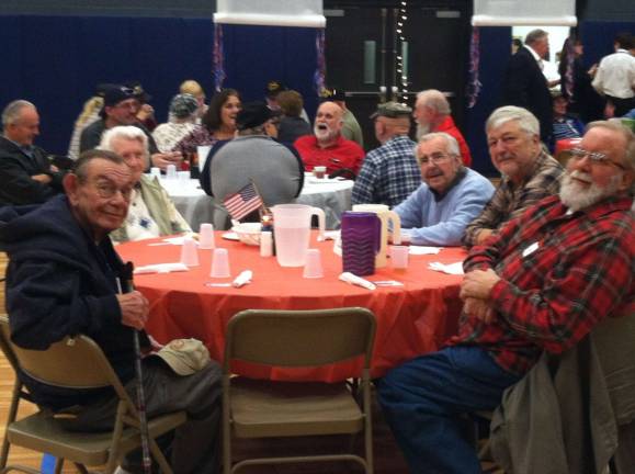 Veterans enjoy their meal and evening.