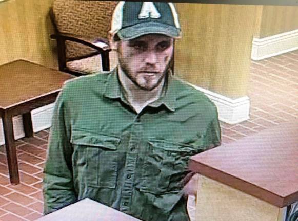 This image provided by the Franklin Borough police shows a suspect, who police identified as William Poltersdorf, 29, of Milford, Pa., who allegedly tried to gain access to a customer's safety deposit box.