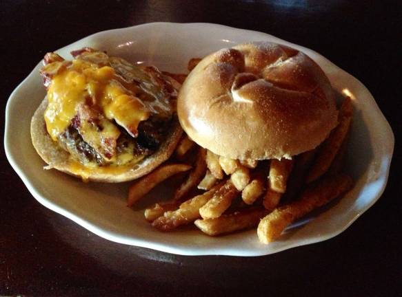 Area restaurants offer unique burgers Photo provided by Krogh's Restaurant Krogh's Restaurant and Brew Pub's Bacon Cheese Burger.