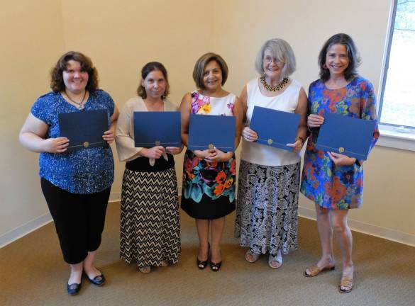 Graduates from Project Self-Sufficiency&#x2019;s Summer Office Skills program.