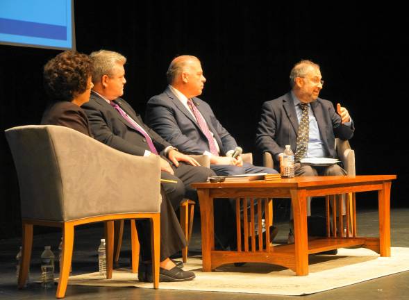 PHOTO BY VERA OLINSKI From right, Marc Pfeiffer addresses the town hall audience with N.J. Senate Pres. Steve Sweeney, N.J. Sen. Steve Oroho, and Lucille Davy.