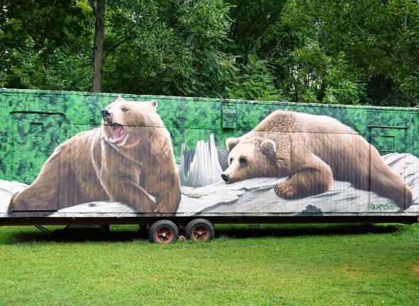 Local resident coordinates local mural project PHOTOS BY VERA OLINSKI "Bears on trailer" mural is part of the "Get Juiced" Kick-off, painted by BK Foxx.