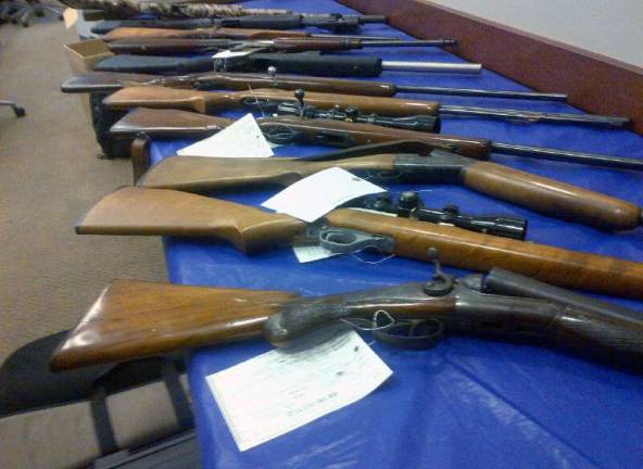 Photo provided by New York State Police State Police said these are the weapons confiscated during the arrest of 18 people Thursday, April 28, in connection with what District Attorney David Hoovler said was a widespread cocaine distribution network that extended from Orange County to Sullivan County and then to Sussex County, N.J.