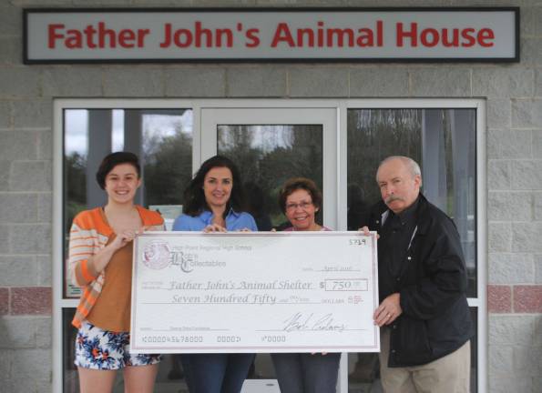 High Point senior raises money for Father John's Animal House From left, are Angela DeStories, Karen Yost, Shelter Director, Peggy Post, President and Bob Adams.