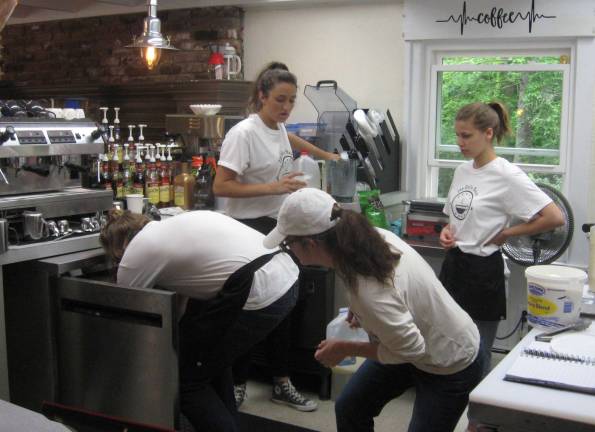 The kitchen is jumping as owner Gina Dobrowolski and staff prepare and serve customers.