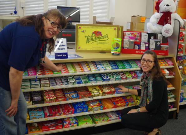 On Saturday before the store opened, Assistant Manager JoAnna Houghtaling of Ogdensburg and employee Kate Lasorsa of Barry Lakes were putting the finishing touches on the displays and stock throughout the store.