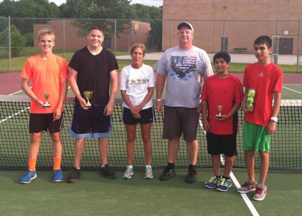 Boys from left to right: Sebastian Mianowski, second place, Ryan McGuire first place; coach Diane Brown, coach Earl Hornyak, Milan Kuryala thrid place; and Evan Hussain, fourth place.