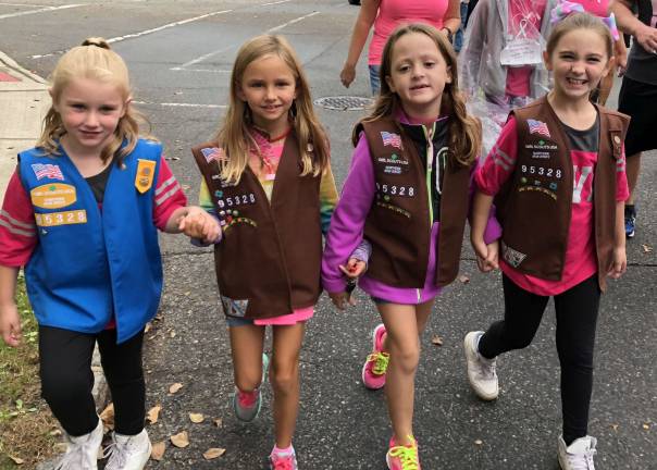 Girl Scouts participate in breast cancer walk