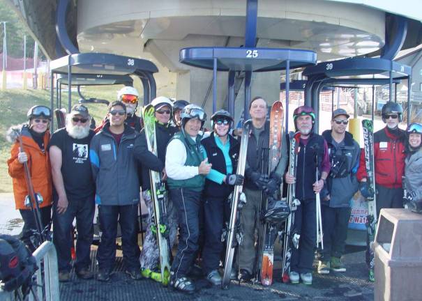 Mountain Creek die hard skiers celebrate the ski season with members of the lift operations staff.
