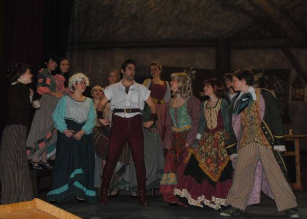 'Beauty and the Beast' at WVRHS The crowd gathers to listen to Gaston (Kevin Naser) and Le Fou (Dylan Koch).