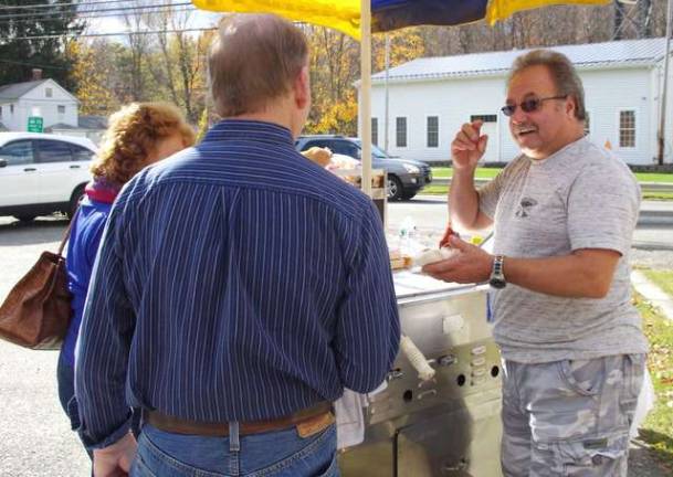 Steve Haggett of Lake Stockholm once again used his 15-year-old Sabrett&#x2019;s hot dog stand that included a generous assortment of toppings to go with his delicious hotdogs.