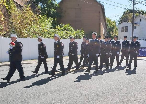 The Wantage Fire Dept. marches together.