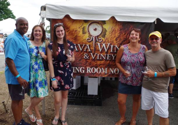 Celebrating friendship and some wine are from the left Garry Benoit of Middletown, N.Y. and Vernon residents Hilary Doidge, Natalie Phillips, Lori LePera and Kevin LePera.