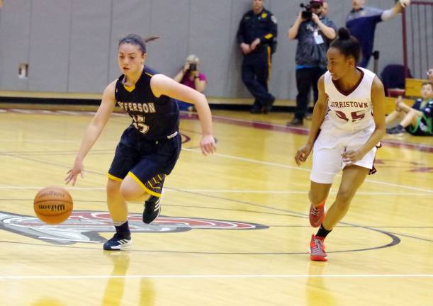 Jefferson falls in tournament final Jefferson's Ashley Hutchinson dribbles the ball as Morristown's Kimberly Calloway keeps pace.