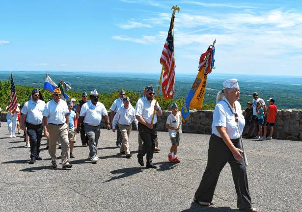 Photos: High Point Veterans Memorial Service <b>Veterans march up to the New Jersey Veterans Memorial for the annual service.</b>