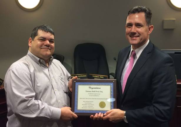 Photo by Diana Goovaerts Franklin Mayor Nicholas Giordano (left) presents borough attorney Thomas Prol with a plaque congratulating him on his appointment as president of the New Jersey State Bar Association.