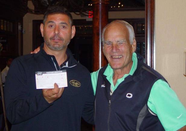 Men&#x2019;s long drive winner Scott Curcio accepts his prize from John Whiting