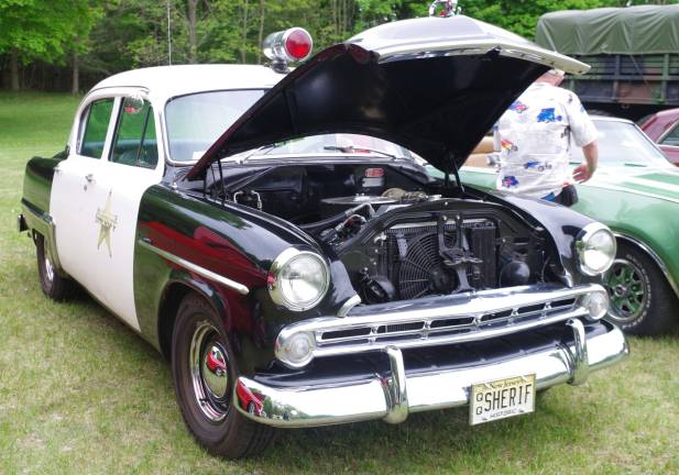 This vintage police car is a 1953 Dodge Meadowbrook owned by Brian and Nancy Taylor.