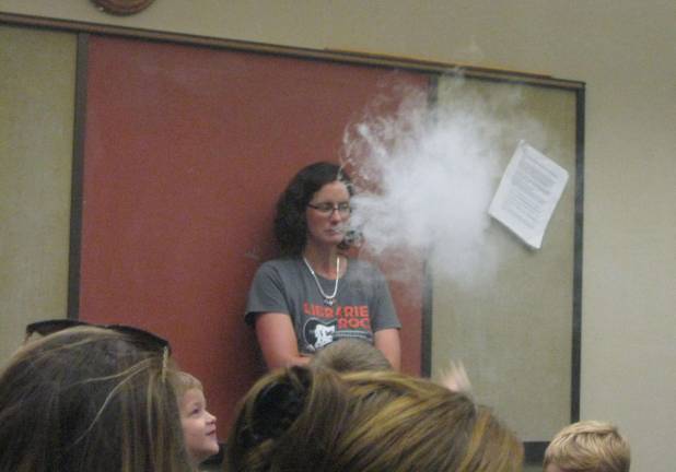 Volcano bubbles pop in mid-air and produce a safe baking soda type smoke.