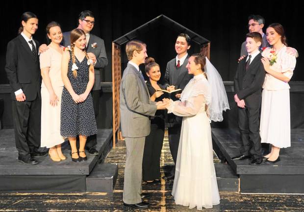 PHOTO BY VERA OLINSKI George Gibbs, Jonathan Cohrs, marries Emily Webb, Gabrielle Ramaglino, in High Point Regional High School's production of &quot;Our Town.&quot;