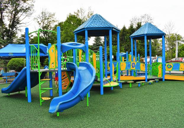 Inclusive playground opens A completely inclusive playground provides opportunities for play that are not available at most playgrounds for children and adults with disabilities. (Photo by Maria Kovic)
