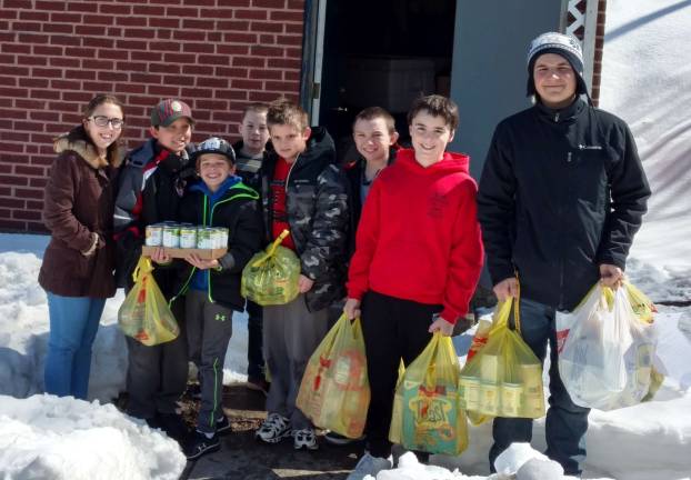 Local scouts conduct food drive