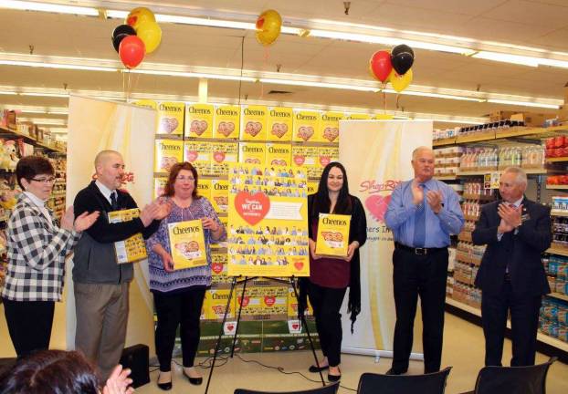 ShopRite employees honored for anti-hunger efforts Cathie Miller, Consumer Affairs Coordinator; John DeCarlo, Store Manager; Partners in Caring Captains Eileen Cusick and Jenn Campbell; Hank Ramberger, Vice President and General Manager; and Terry Jerauld, Director of Store Operations