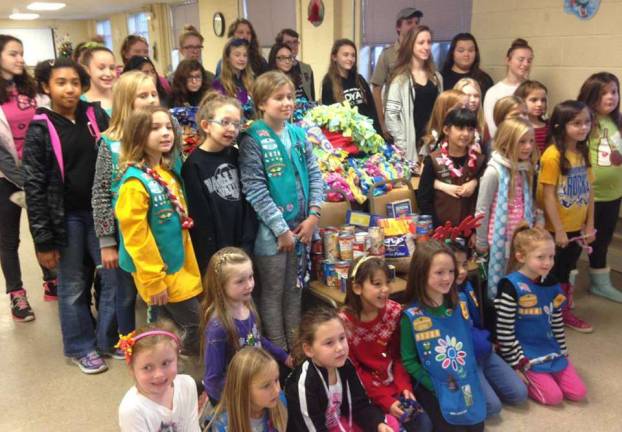Girl Scouts make blankets, hats
