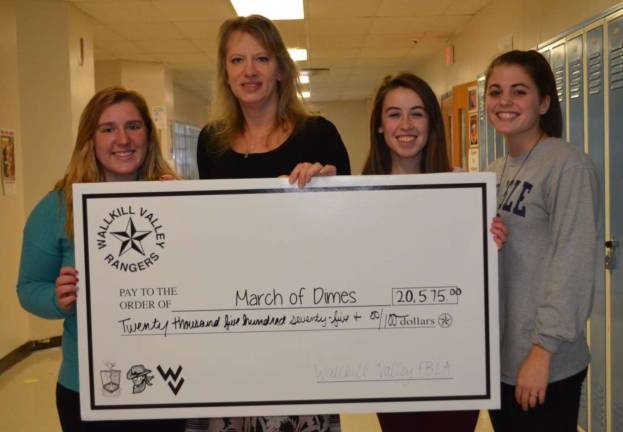 Pictured from left, are Alexa Batelli, FBLA community service vice president; JoAnn Bartoli, the March of Dimes senior community director of the North Jersey Division; Fiona Brown, FBLA community service vice president; and Carly DeOliveira, FBLA president.