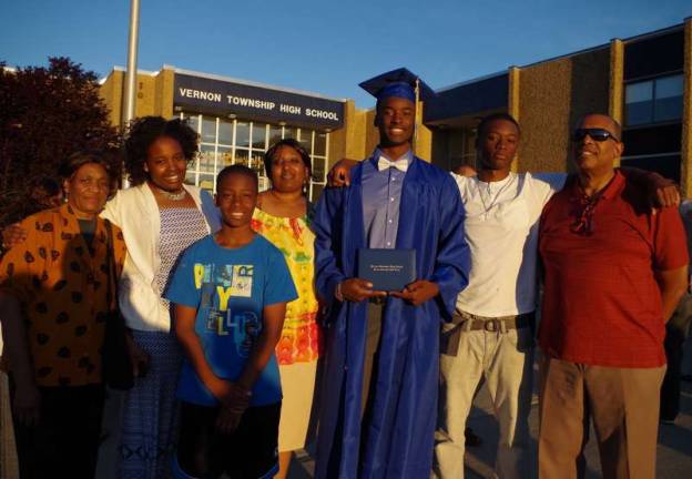 Graduate Joshua Felix and his family.