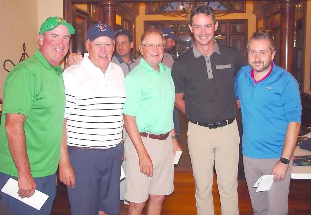 Event Champions David Goddard, Woody Osterhoudt, Gerry Hughes and Patrick Matthews receive their prize from Ballyowen GM Mark Melillo