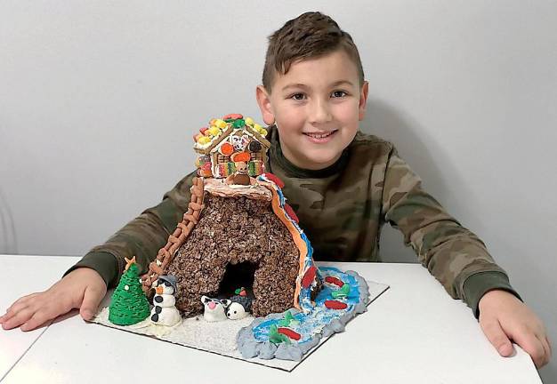 Gingerbread houses delight the judges Andras Varga-Joo, third place kit, ages 6-8